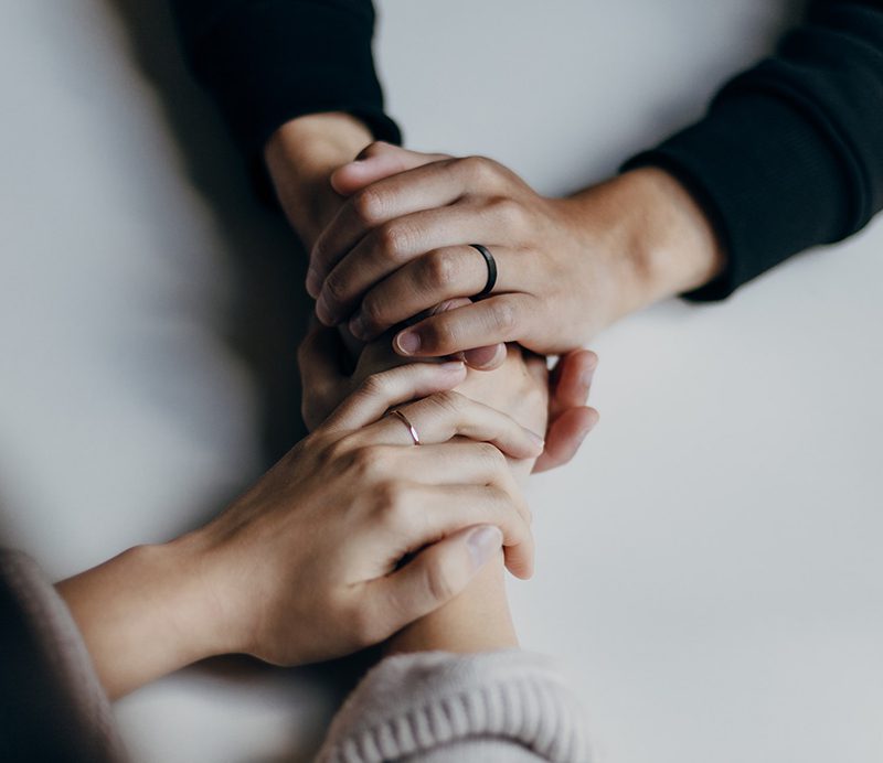 mental health college students hands grasp