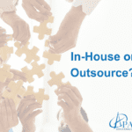 Puzzle pieces with the words in-house or outsource?